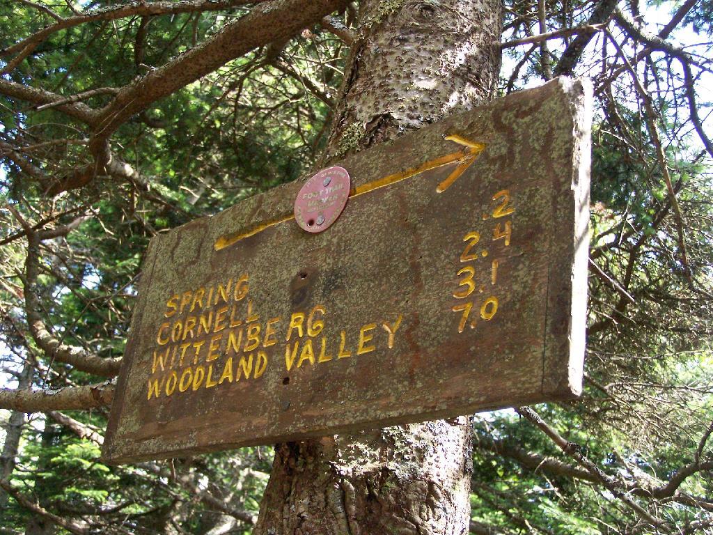 Photo: Sign Down the Steep Side of Slide Photo: Sign Down the Steep Side of Slide