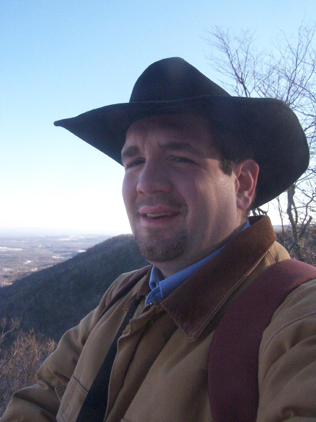 Photo: Looking Off Cliff With Beat Up Old Hat Photo: Looking Off Cliff With Beat Up Old Hat