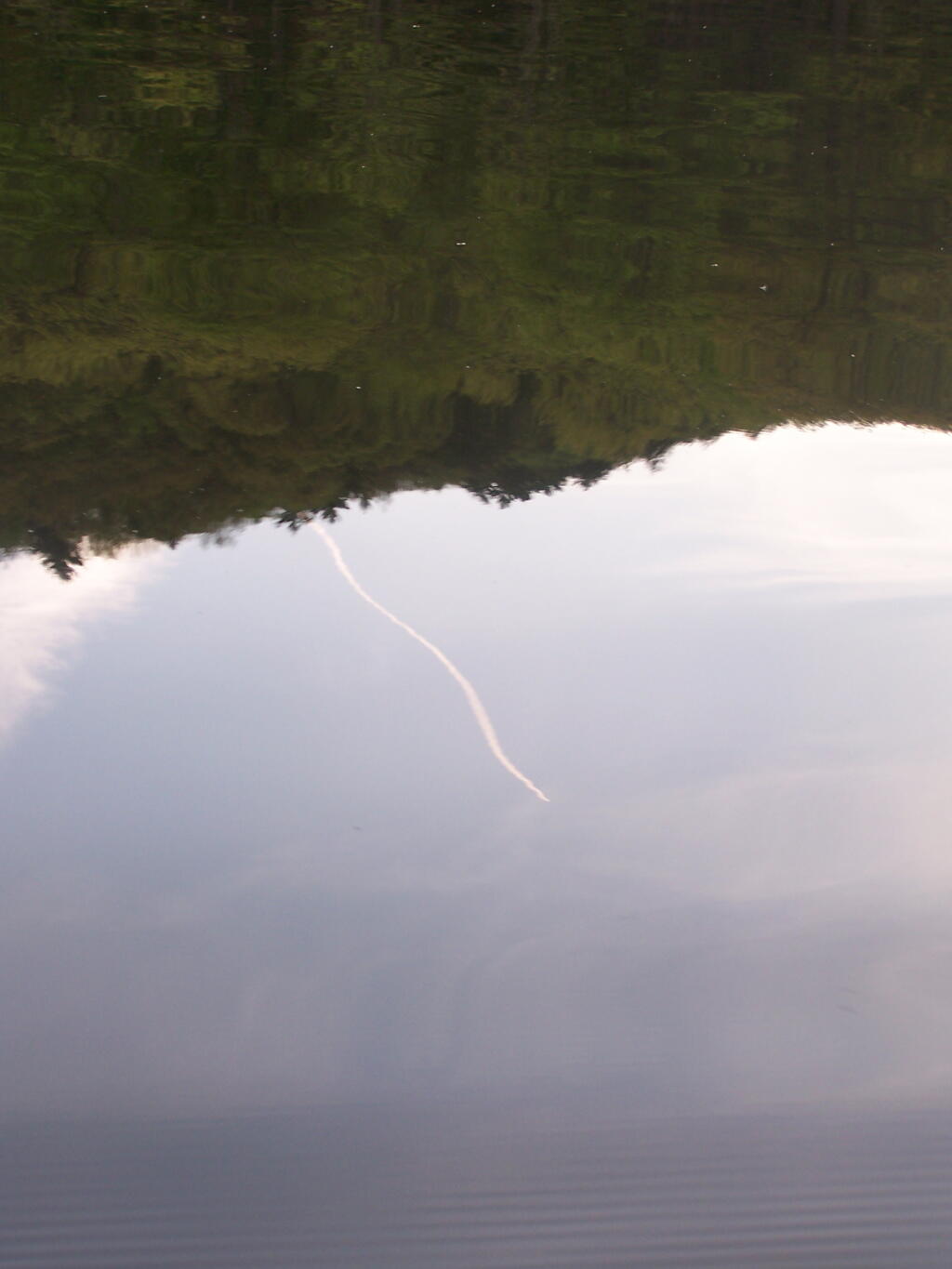 Photo: Jet Trail Reflected Photo: Jet Trail Reflected