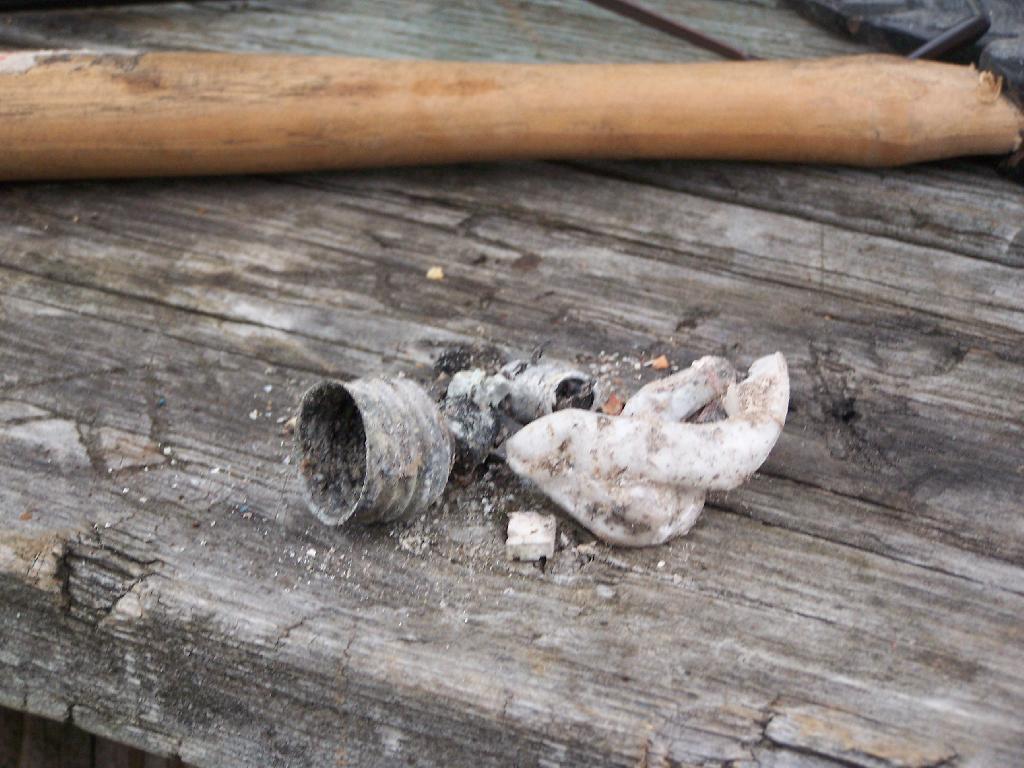 Photo: Remains of the Compact Florescent Bulb Photo: Remains of the Compact Florescent Bulb