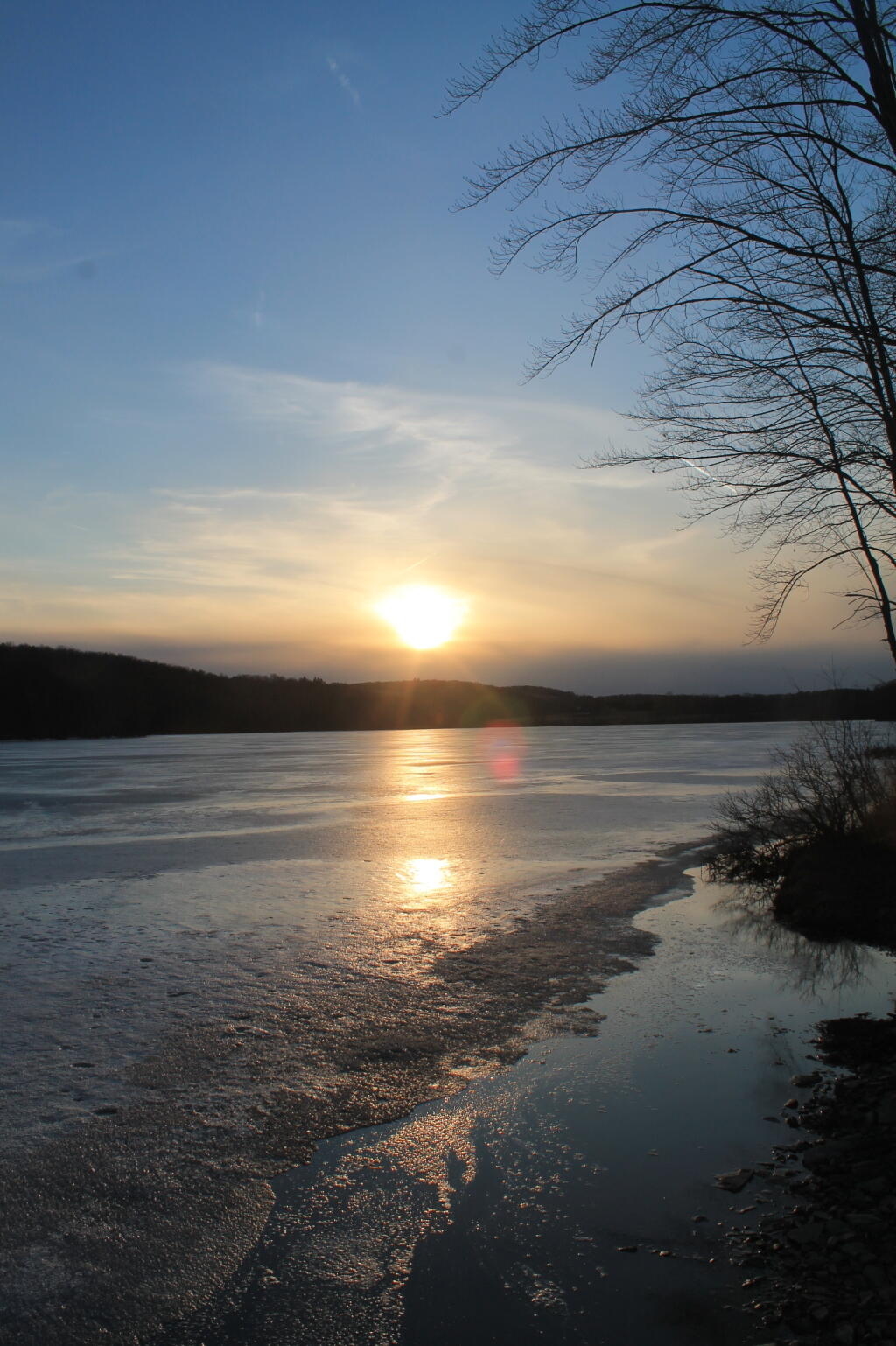 Photo: Setting Sun Over Frozen Lake Photo: Setting Sun Over Frozen Lake