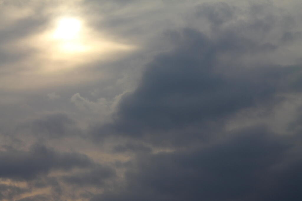 Photo: Peaking thru the Clouds Photo: Peaking thru the Clouds