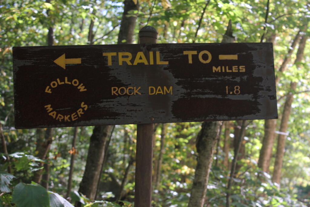 Photo: Old Style Steel Rock Dam Trailhead Sign Photo: Old Style Steel Rock Dam Trailhead Sign
