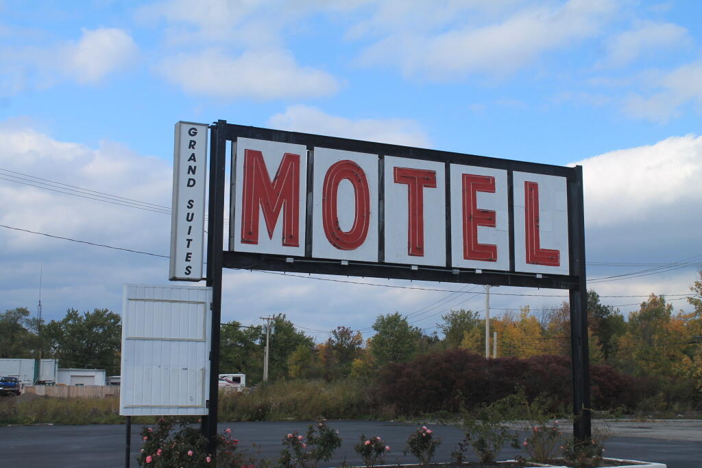Photo: Grand Suite Motel Sign Photo: Grand Suite Motel Sign
