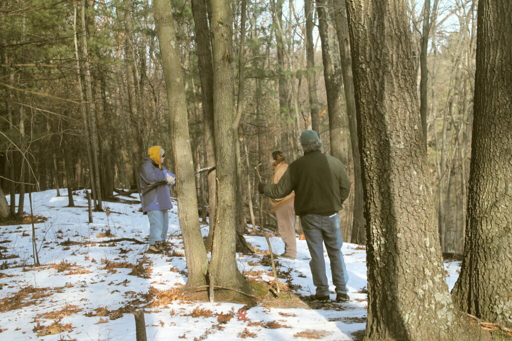 Photo: Hikers Listen to John Wolcott Photo: Hikers Listen to John Wolcott