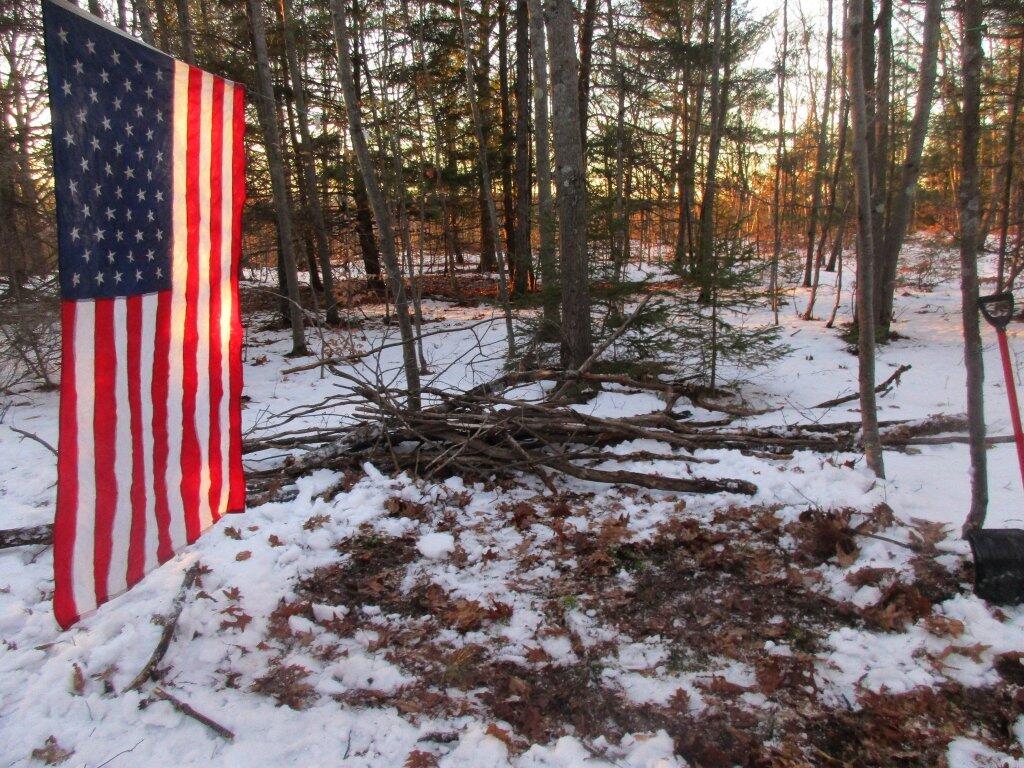 Photo: Gathering Wood Getting Area Shoveled Out For Campfire Photo: Gathering Wood Getting Area Shoveled Out For Campfire